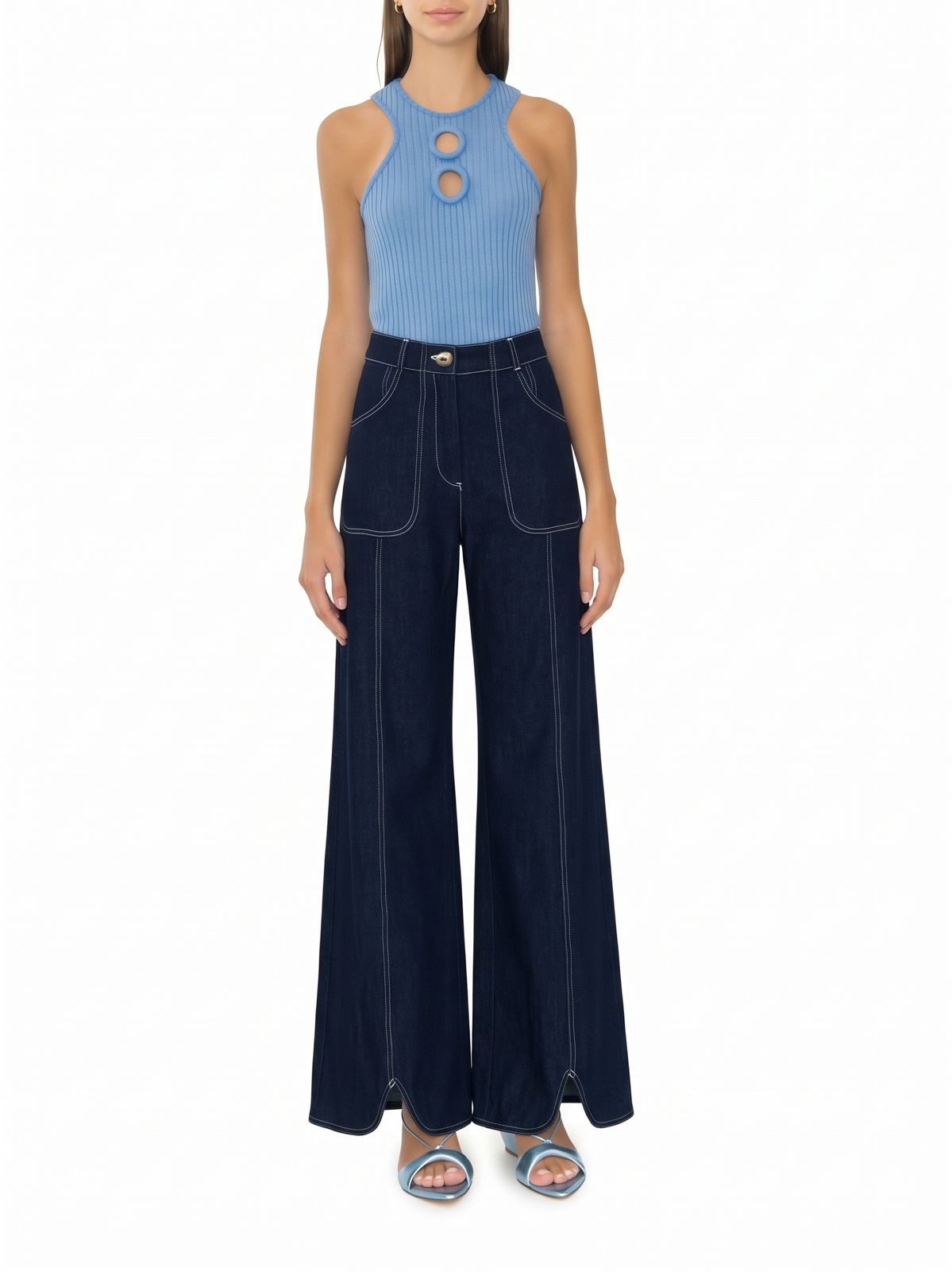Dark blue denim jeans with wide leg, patch pockets, and button closure