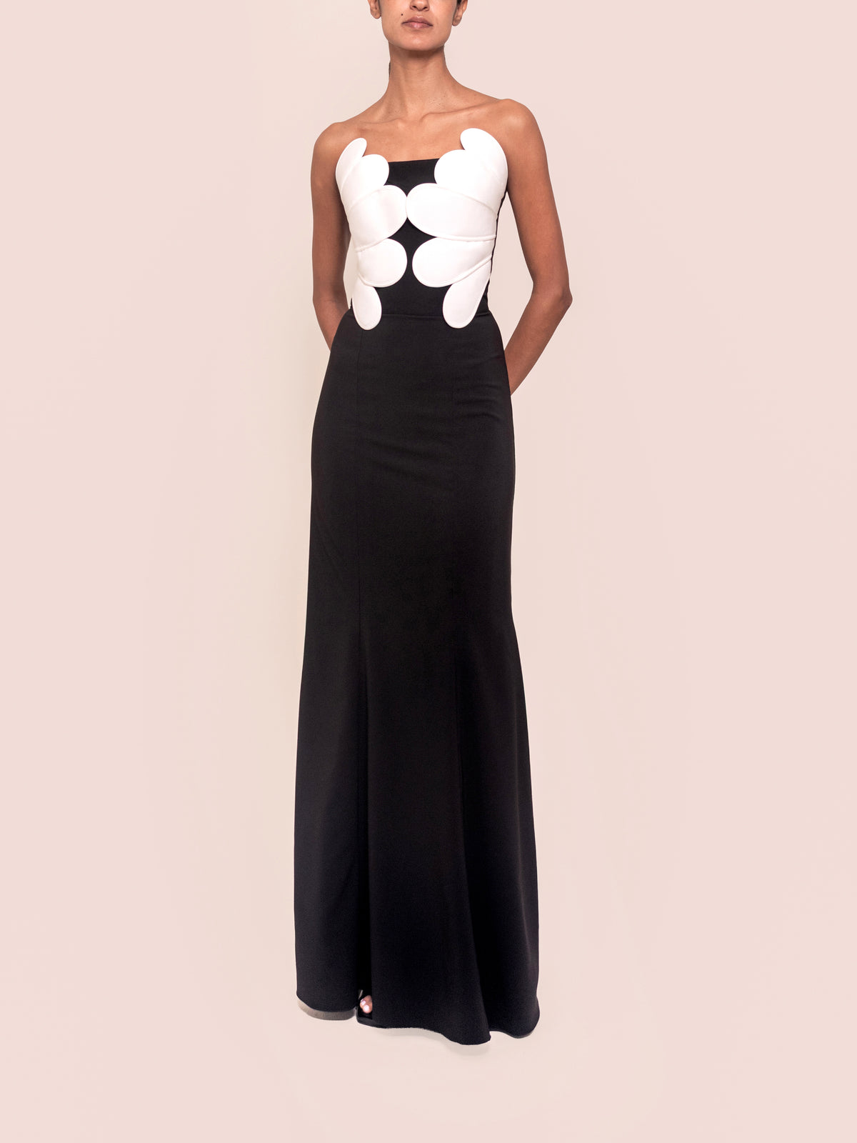 Black maxi dress with white flower applique bodice and long flowing skirt