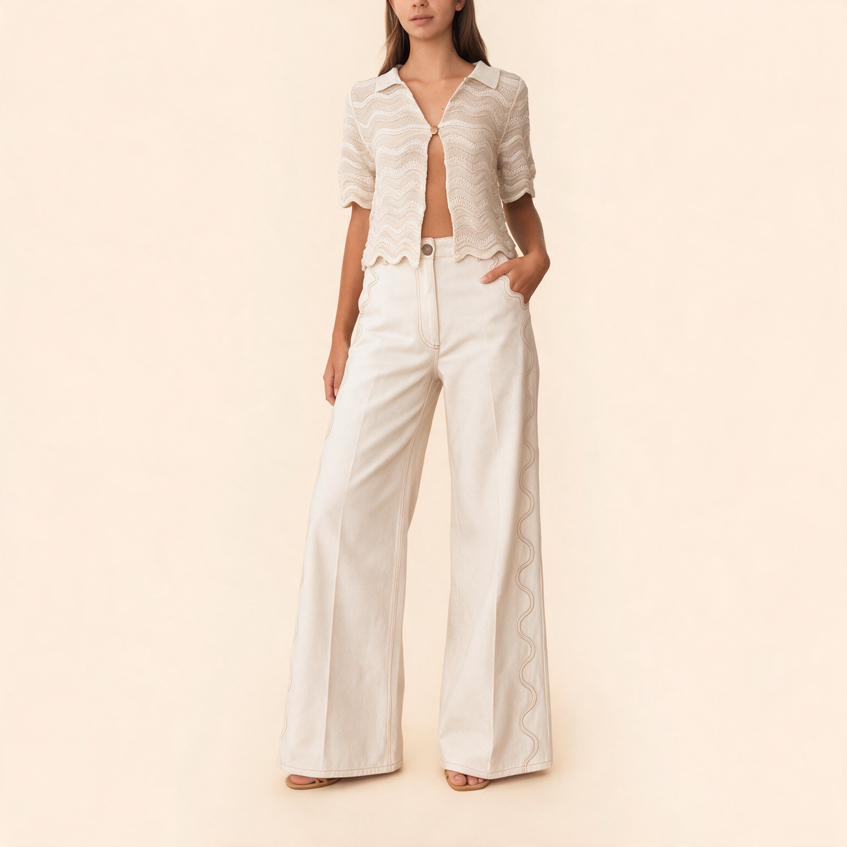 MALAI ivory wide-leg jeans with wavy contrast side seams and deep front pockets